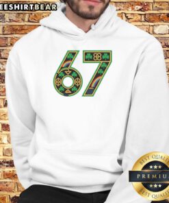 Good Celtic graphic of an Irish clover shamrock on a St. Patrick's Day hoodie, perfect for festive celebrations.