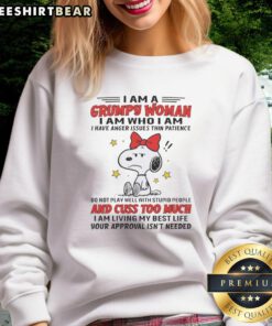 Grumpy woman wearing a sweatshirt that reads 'I Am Who I Am - I Have Anger Issues, Thin Patience'. Stylish and bold.