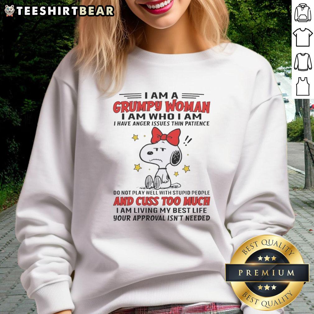 Grumpy woman wearing a sweatshirt that reads 'I Am Who I Am - I Have Anger Issues, Thin Patience'. Stylish and bold.