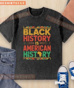 Vintage washed black t-shirt featuring 'Black History is American History' design, celebrating cultural heritage.