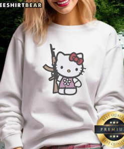 Cute Hello Kitty holding an AK-47 rifle on a stylish sweatshirt, perfect for unique fashion lovers.