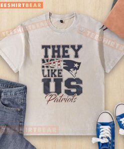 Nice New England Patriots 'They Not Like Us' logo washed t-shirt showcasing team spirit and style.