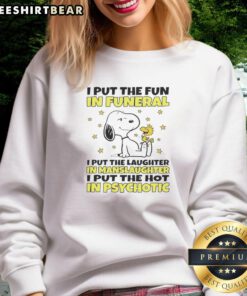 Alt Text: Snoopy sweatshirt with humorous quote: 'I Put The Fun In Funeral' showcasing unique, quirky style.