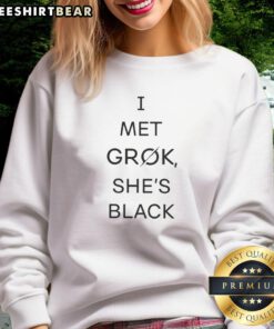 Alt Text: Official I Met Grok She's Black Sweatshirt showcasing a stylish black design with unique text for fans.