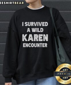 Cozy black sweatshirt featuring 'I Survived a Wild Karen Encounter' text for humorous fans of viral encounters.