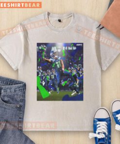 Jaxon Smith-Njigba wearing a Seattle Seahawks Super Bowl LX Champions 2026 t-shirt, celebrating victory in style.