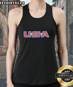 Official Owen Shroyer wearing a USA tank top, showcasing patriotism and style in a vibrant outdoor setting.