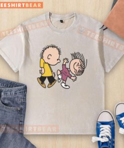 Official Peanuts Greatest Hits Rockin' Out to Linus and Lucy washed t-shirt featuring vibrant graphic design.