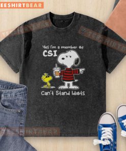 Alt Text: Official Peanuts Snoopy 'Yes I'm A Member Of CSI Can't Stand Idiots' washed t-shirt featuring iconic cartoon design.