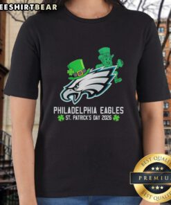 Official Philadelphia Eagles Football St. Patrick's Day 2026 Ladies Tee featuring festive green design and team logo.