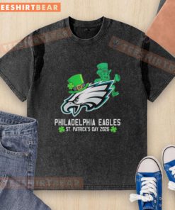 Official Philadelphia Eagles Football X St. Patrick's Day 2026 washed t-shirt featuring green design and team logo.