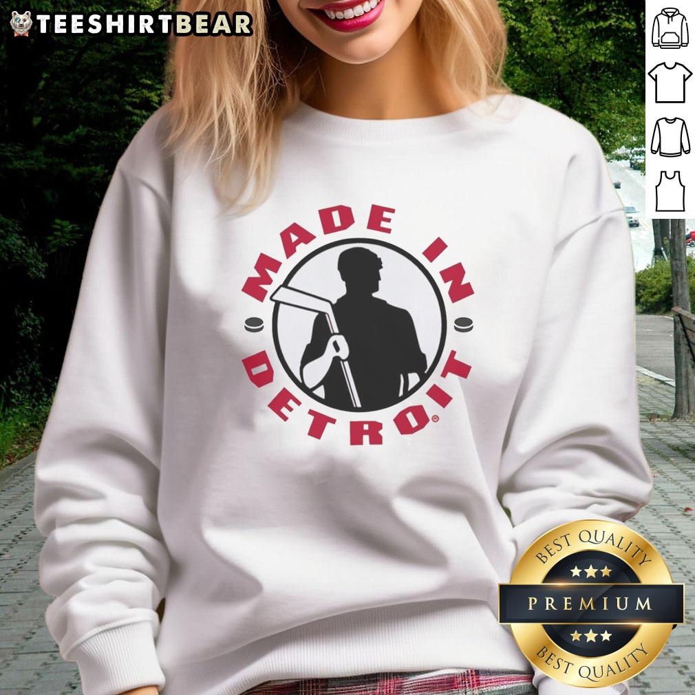 Alt Text: Premium Made in Detroit Red Wings hockey sweatshirt featuring vibrant team colors and logo, perfect for fans.