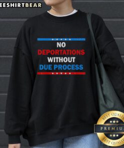 Premium No Deportations Without Due Process Political Protest Sweatshirt worn by activist at a rally for immigrant rights.