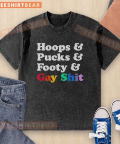 Alt Text: Premium Sarah Spain hoops and pucks graphic t-shirt featuring footy and LGBTQ+ themes in a stylish design.