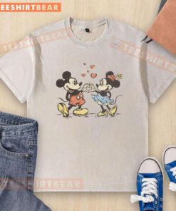Premium Two Hands One Heart Mickey Mouse Minnie Mouse washed t-shirt featuring a playful design and vibrant colors.