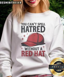 Alt Text: Funny sweatshirt featuring You Can't Spell Hatred Without A Red Hat design, perfect for casual wear and humor lovers.