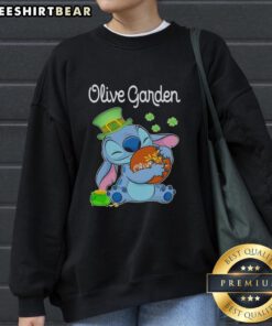 Pretty Stitch St. Patrick's Hug sweatshirt featuring Olive Garden logo, perfect for festive celebrations and cozy style.