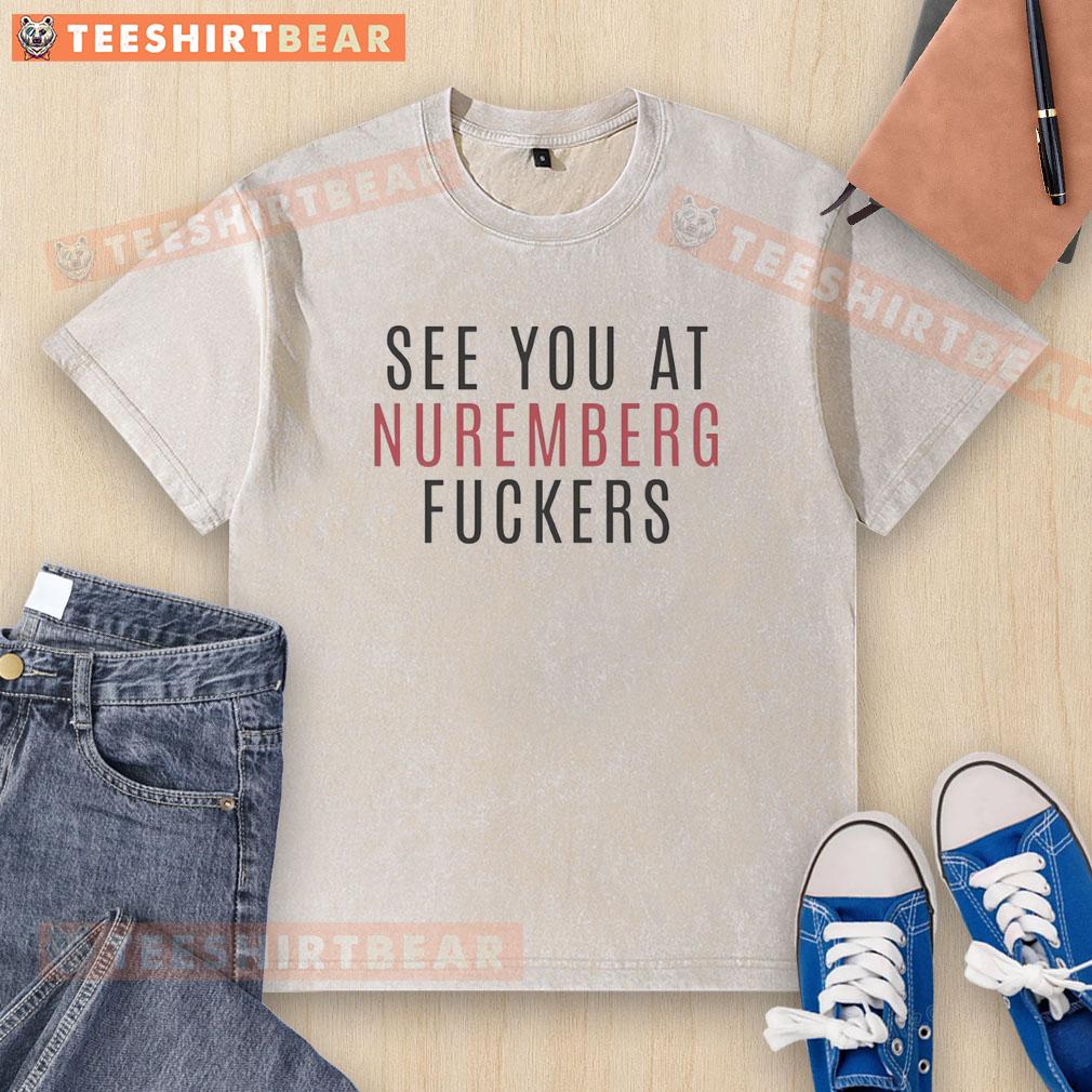 Alt Text: Top Abolish ICE See You at Nuremberg T-Shirt featuring bold text and graphic design for activist apparel.