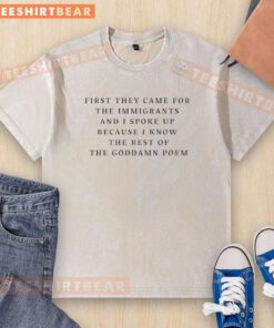 Alt Text: Top First They Came For The Immigrants washed t-shirt featuring bold text design promoting immigration awareness.