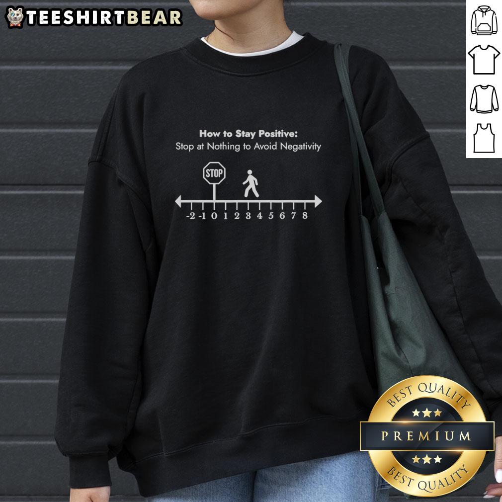 Alt Text: Cozy sweatshirt featuring the phrase 'Stop At Nothing To Avoid Negativity' for a positive mindset.