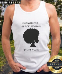 Black woman wearing 'Top Phenomenal Woman' tank top, showcasing confidence and empowerment in a vibrant urban setting.