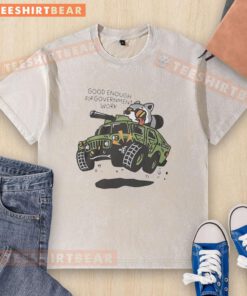 Alt Text: Funny graphic washed t-shirt featuring a raccoon driving a tank, perfect for casual wear and government work humor.
