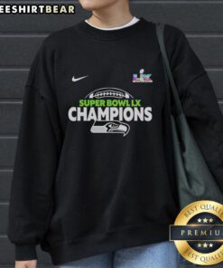 Top Seattle Seahawks Super Bowl Champions football sweatshirt featuring team logo and vibrant colors.