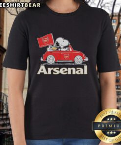 Alt Text: Snoopy and Woodstock driving an Arsenal red car, raising a flag, featured on a ladies tee shirt design.