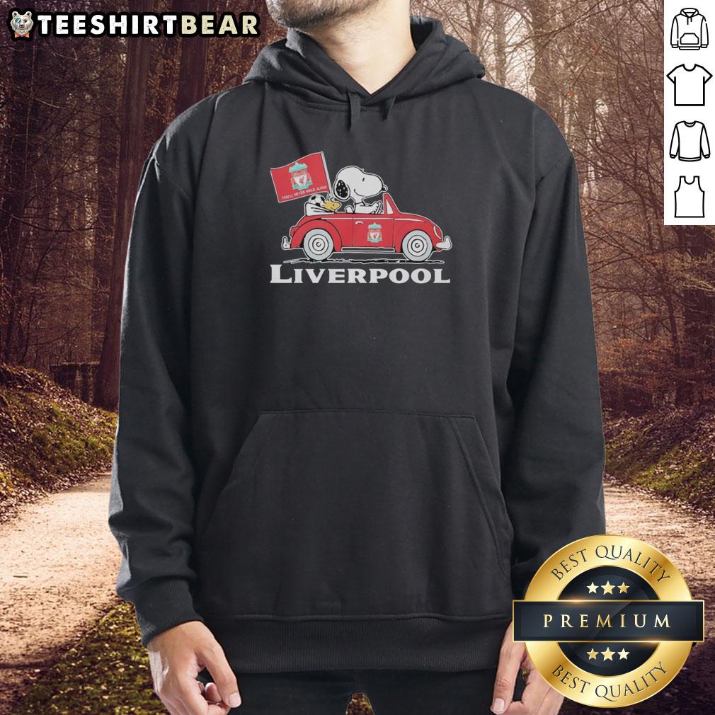 Alt Text: Snoopy and Woodstock driving a Liverpool FC red car while raising a flag, wearing a stylish hoodie.