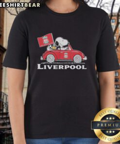 Top Snoopy and Woodstock driving a Liverpool FC red car, raising a flag on a ladies tee shirt design.