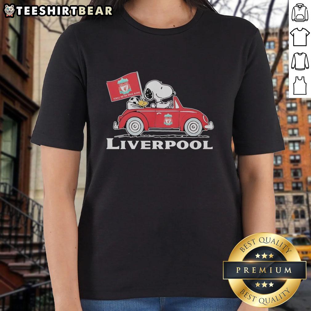 Top Snoopy and Woodstock driving a Liverpool FC red car, raising a flag on a ladies tee shirt design.