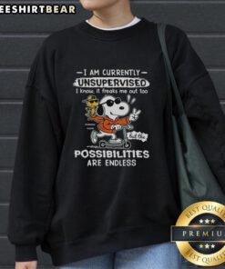 Snoopy and Woodstock riding a scooter on a fun sweatshirt with I Am Currently Unsupervised text. Perfect for fans!