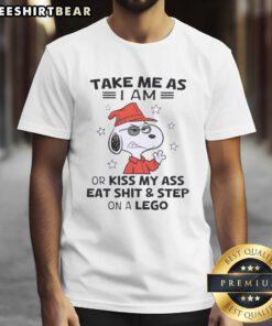 Top Snoopy Take Me As I Am Or Kiss My Ass Eat Shit And Step On A Lego T-Shirt featuring a playful Snoopy graphic.
