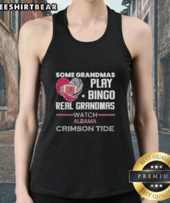 Real grandmas in Alabama Crimson Tide tank tops enjoy bingo at a lively game night, showcasing their team spirit.