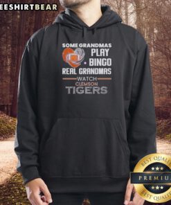 Grandmas in Clemson Tigers hoodies enjoying a fun bingo game, showcasing the spirit of real grandmas who love football.