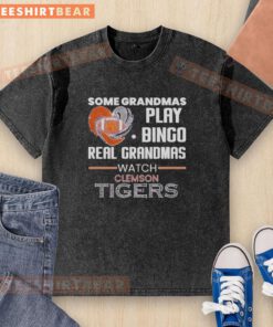 Grandmas enjoying Clemson Tigers game in washed T-shirts, proving real grandmas watch Clemson Tigers and play bingo.