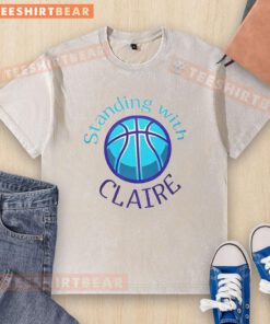 Top standing with Claire in NDSU women's basketball washed t-shirt, showcasing team spirit and style.