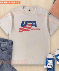 Alt Text: Top Team USA Ice Hockey flag logo on a washed t-shirt, showcasing patriotic spirit and sporty style.