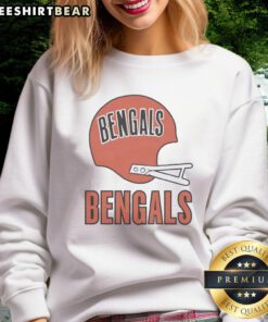 Alt Text: Cincinnati Bengals football logo featured on a stylish big helmet sweatshirt, perfect for fans and chilly game days.