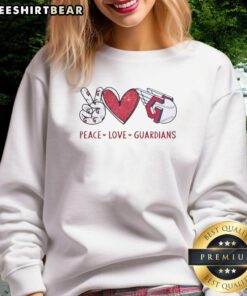 Alt Text: Awesome Cleveland Guardians sweatshirt featuring a heart-shaped hand sign and team logo, perfect for fans.