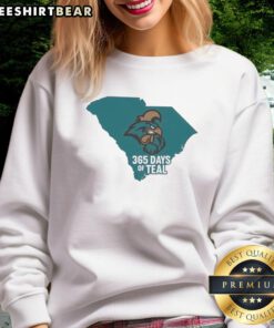 Alt Text: Cozy teal sweatshirt featuring the Coastal Carolina Chanticleers logo, perfect for fans all year round.