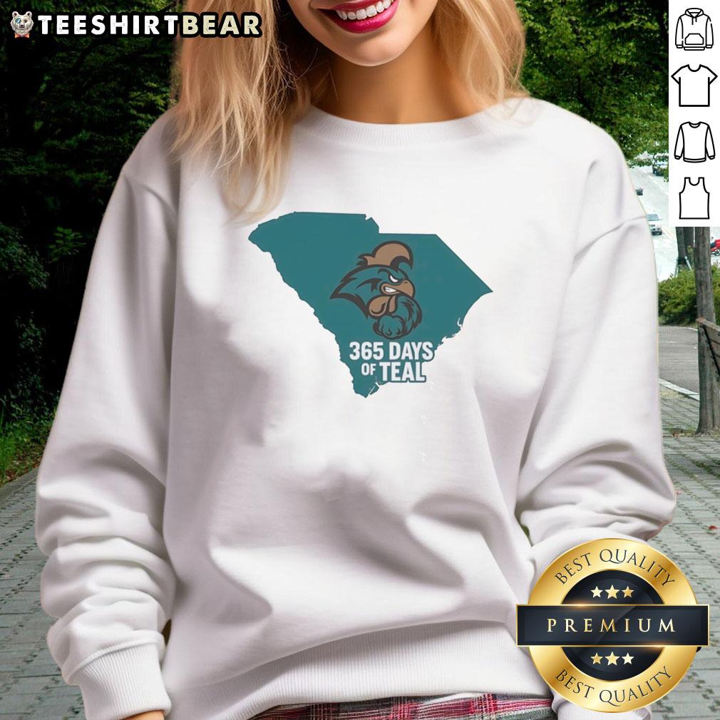 Alt Text: Cozy teal sweatshirt featuring the Coastal Carolina Chanticleers logo, perfect for fans all year round.