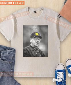 Alt Text: Hot Legendary Notre Dame Coach Lou Holtz 1937-2026 washed t-shirt featuring vintage design and iconic coach imagery.