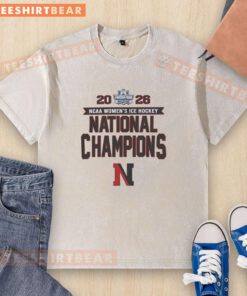 2026 NCAA Women's Ice Hockey Frozen Four Champions T-shirt featuring Northeastern Huskies logo and washed design.