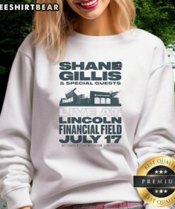 Shane Gillis and special guests performing live at Lincoln Financial Field on July 17, featuring a stylish sweatshirt.