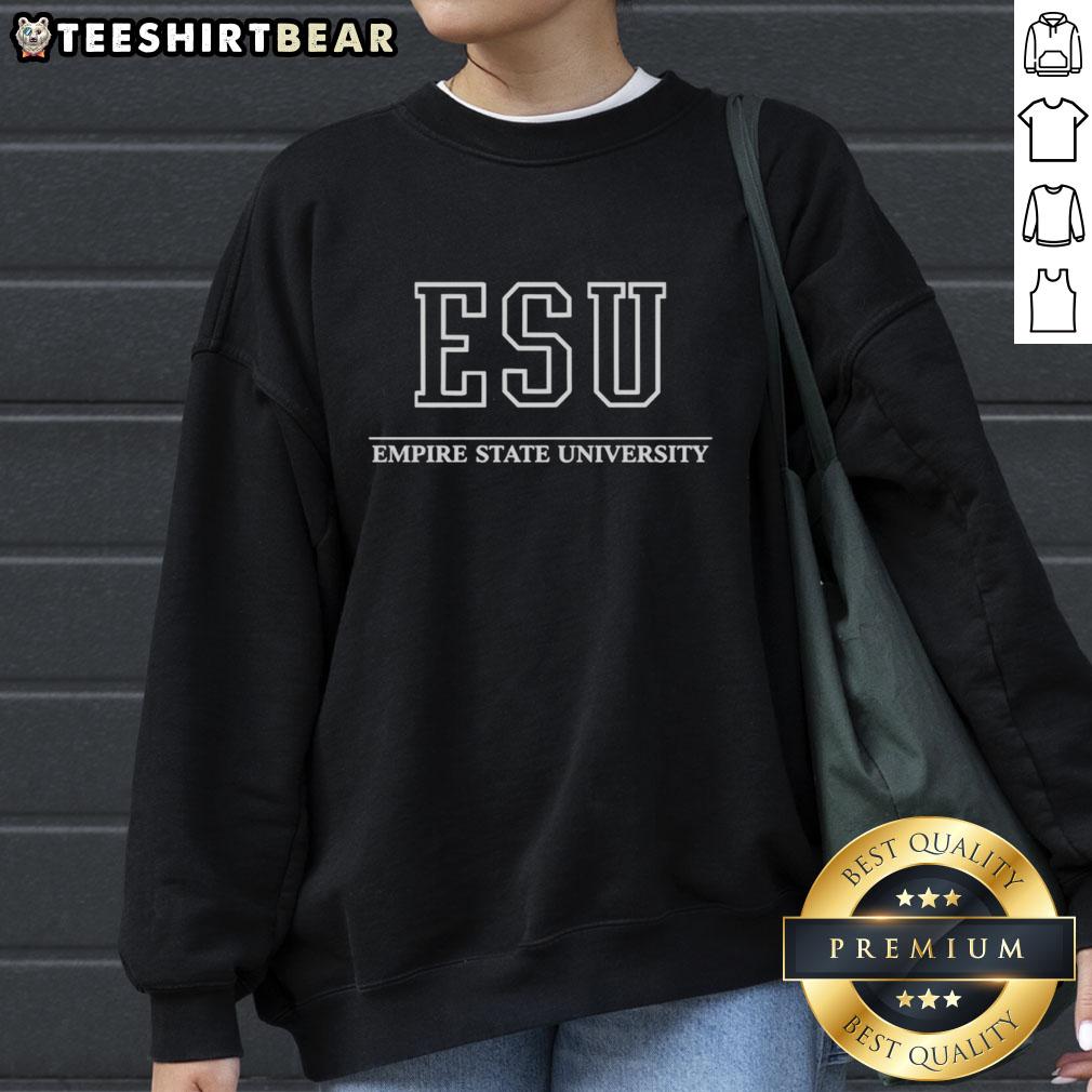 Nice Tom Holland wearing an Empire State University sweatshirt, showcasing a stylish and casual look.
