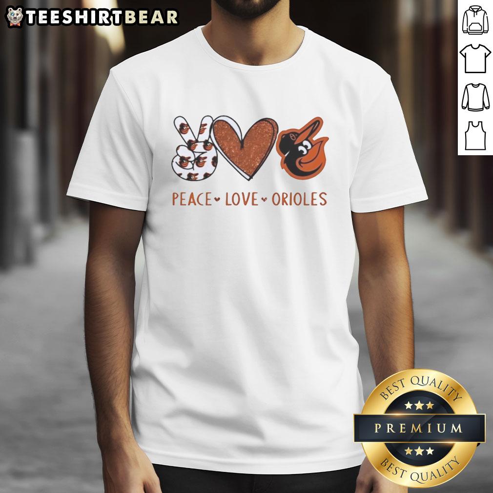 Alt Text: Official Baltimore Orioles T-shirt featuring Peace Love Orioles hand sign, heart shape, and team logo design.