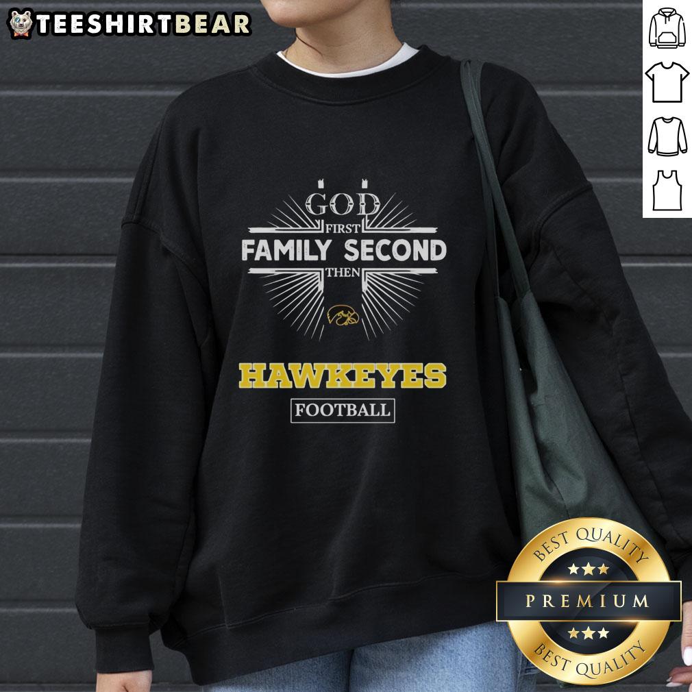 Official Iowa Hawkeyes sweatshirt with 'God First, Family Second, Then Hawkeyes Football' slogan, perfect for fans.
