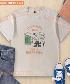 Alt Text: Cartoon leprechaun celebrating St. Patrick's Day on a washed t-shirt with the phrase It's Always Time for a Friday Beer.