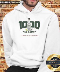 Official Jared Spurgeon 1000 NHL Games hoodie featuring team colors and logo, perfect for fans celebrating his milestone.